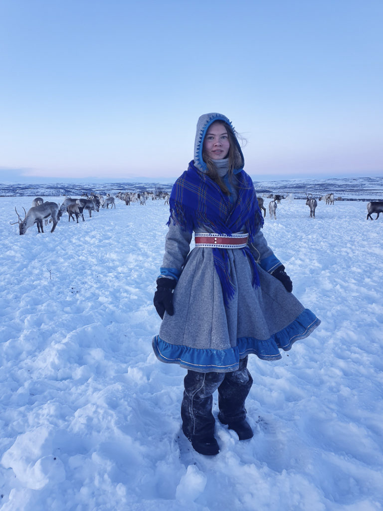 The daughter, Biret Helene, makes her own gákti (garment) © Marit Helene Eira