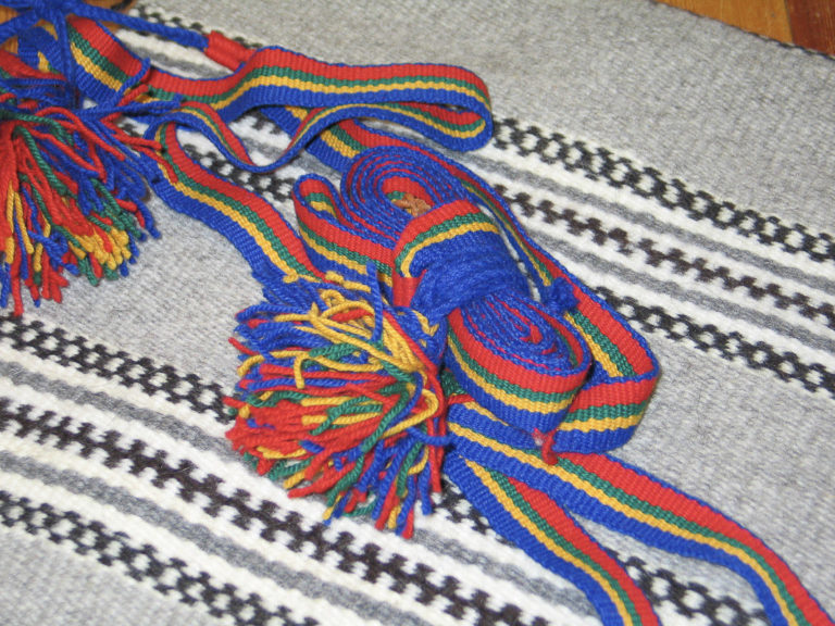 Komag bands, used to wrap around the traditional pointed leather shoes worn by the coastal Sámi, on a grene woven using age-old techniques © Gunn Isaksen/Grenebua i Manndalen