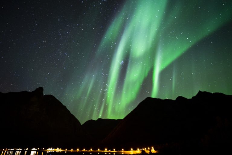 Green rays of Northern Lights over a beach just north of Harstad © Jan Schmitt