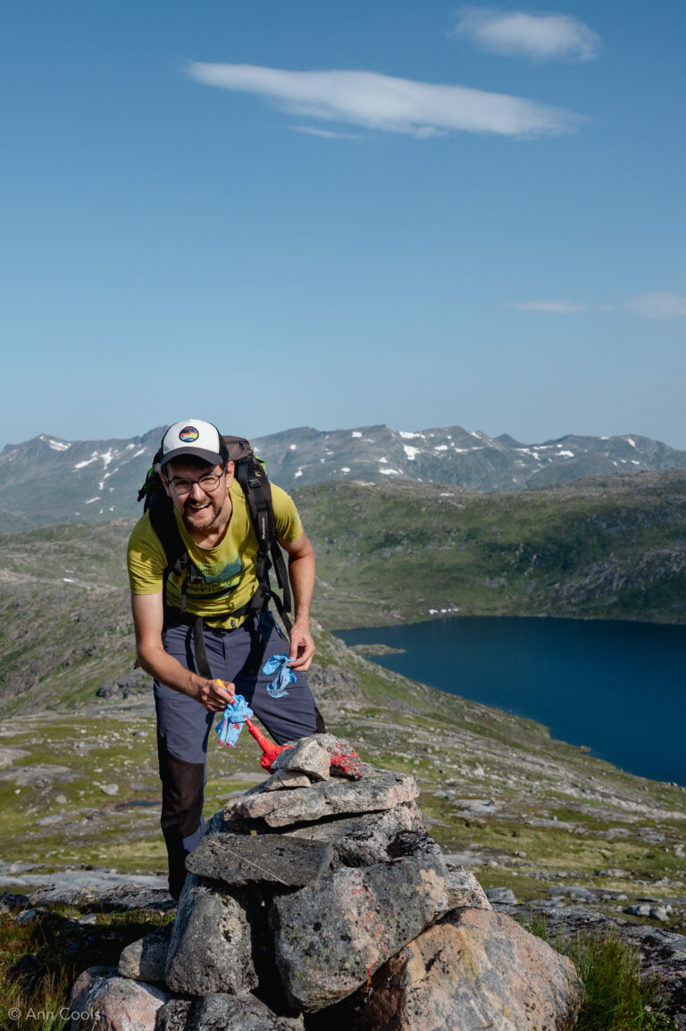 A mountain trail marker gets a fresh coat of paint © Rissa Citizen Science