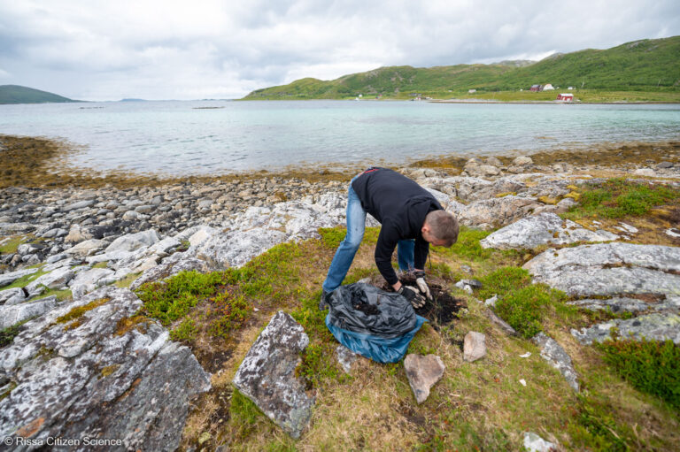 A campfire scar marring the fjord landscape west of Tromsø is removed © Rissa Citizen Science